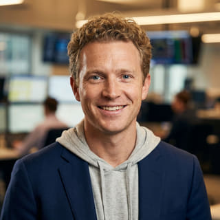 Foto del profilo di Ryan Brooks, presentato come Lead Trading Analyst di Pattuizanza